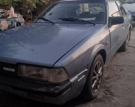 Синий Мазда 626, объемом двигателя 2 л и пробегом 111 тыс. км за 1000 $, фото 1 на Automoto.ua
