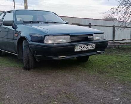 Синий Мазда 626, объемом двигателя 2 л и пробегом 370 тыс. км за 950 $, фото 3 на Automoto.ua