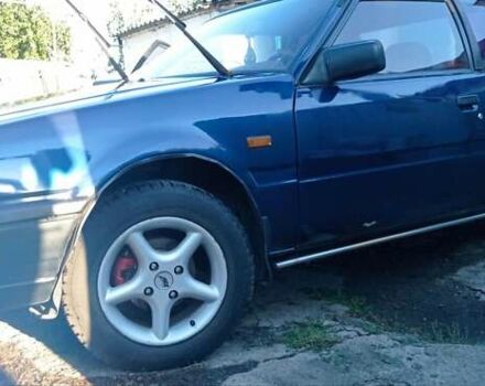 Синий Мазда 626, объемом двигателя 2 л и пробегом 370 тыс. км за 950 $, фото 8 на Automoto.ua