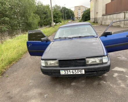 Синий Мазда 626, объемом двигателя 2 л и пробегом 420 тыс. км за 484 $, фото 3 на Automoto.ua