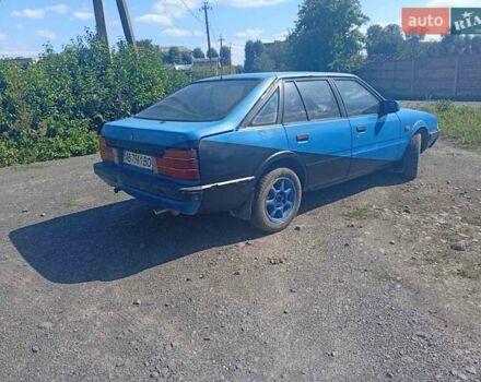 Синій Мазда 626, об'ємом двигуна 1.6 л та пробігом 65 тис. км за 600 $, фото 13 на Automoto.ua