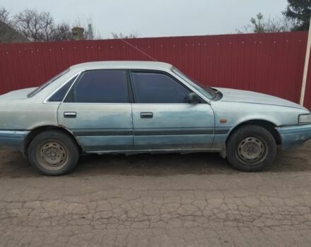 Синий Мазда 626, объемом двигателя 0 л и пробегом 400 тыс. км за 700 $, фото 1 на Automoto.ua