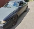 Синий Мазда 626, объемом двигателя 2.2 л и пробегом 200 тыс. км за 671 $, фото 1 на Automoto.ua