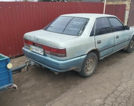 Синий Мазда 626, объемом двигателя 0 л и пробегом 400 тыс. км за 700 $, фото 2 на Automoto.ua