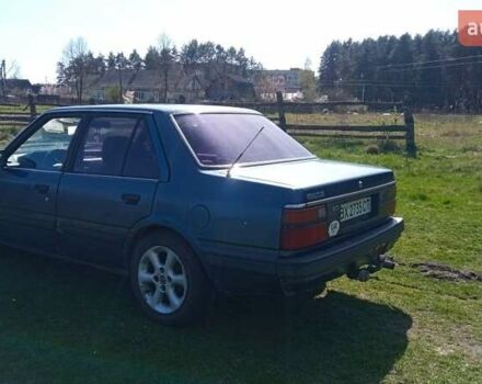 Синий Мазда 626, объемом двигателя 2 л и пробегом 490 тыс. км за 1000 $, фото 6 на Automoto.ua
