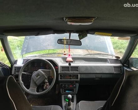 Синий Мазда 626, объемом двигателя 2 л и пробегом 387 тыс. км за 1500 $, фото 5 на Automoto.ua