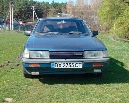 Синий Мазда 626, объемом двигателя 2 л и пробегом 490 тыс. км за 1000 $, фото 4 на Automoto.ua