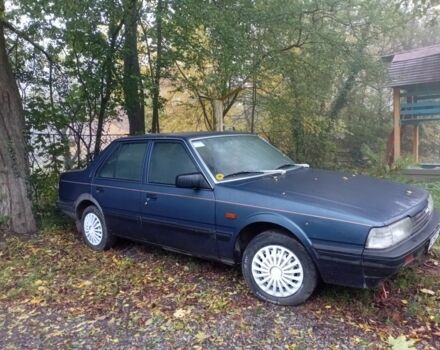 Синій Мазда 626, об'ємом двигуна 2 л та пробігом 367 тис. км за 1500 $, фото 1 на Automoto.ua