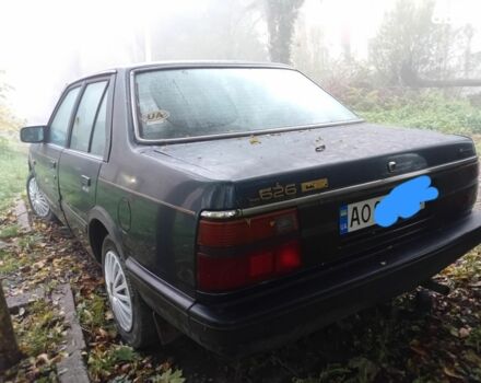 Синий Мазда 626, объемом двигателя 2 л и пробегом 387 тыс. км за 1500 $, фото 3 на Automoto.ua