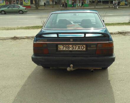 Синий Мазда 626, объемом двигателя 2 л и пробегом 1 тыс. км за 1500 $, фото 2 на Automoto.ua