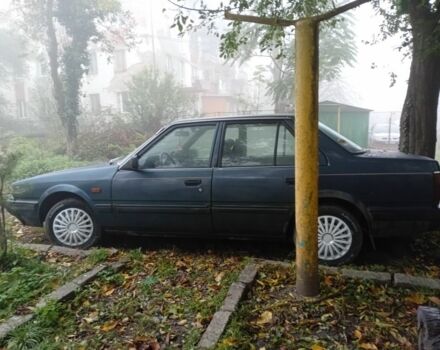 Синий Мазда 626, объемом двигателя 2 л и пробегом 280 тыс. км за 1500 $, фото 2 на Automoto.ua