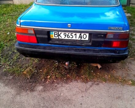 Синий Мазда 626, объемом двигателя 2 л и пробегом 0 тыс. км за 800 $, фото 1 на Automoto.ua