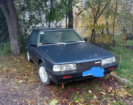 Синий Мазда 626, объемом двигателя 2 л и пробегом 387 тыс. км за 1500 $, фото 1 на Automoto.ua