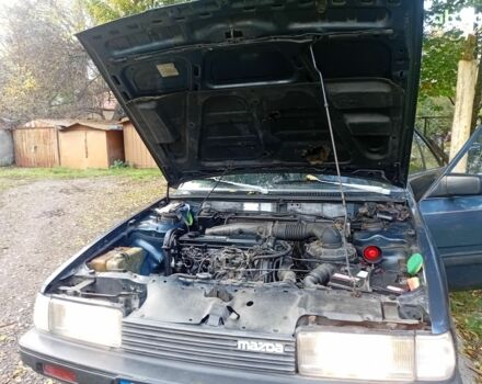 Синий Мазда 626, объемом двигателя 2 л и пробегом 387 тыс. км за 1500 $, фото 11 на Automoto.ua