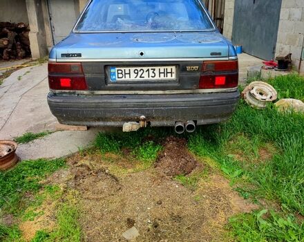 Синій Мазда 626, об'ємом двигуна 2 л та пробігом 380 тис. км за 550 $, фото 1 на Automoto.ua