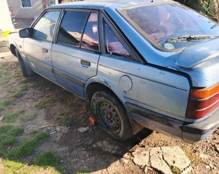 Синий Мазда 626, объемом двигателя 1.6 л и пробегом 100 тыс. км за 200 $, фото 4 на Automoto.ua