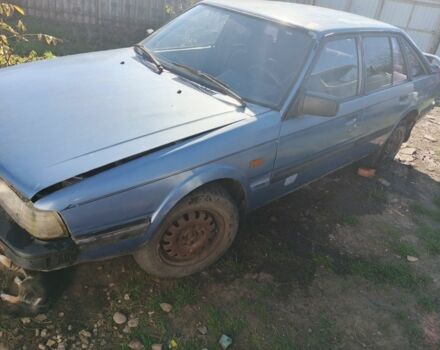 Синий Мазда 626, объемом двигателя 1.6 л и пробегом 100 тыс. км за 200 $, фото 2 на Automoto.ua