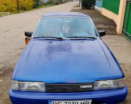 Синий Мазда 626, объемом двигателя 2 л и пробегом 403 тыс. км за 1000 $, фото 2 на Automoto.ua