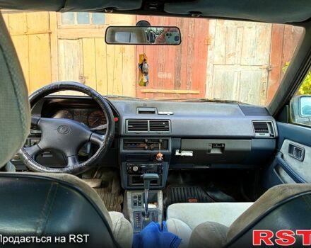 Синий Мазда 626, объемом двигателя 1.6 л и пробегом 380 тыс. км за 300 $, фото 2 на Automoto.ua