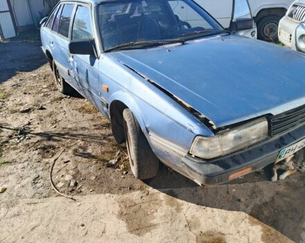 Синий Мазда 626, объемом двигателя 1.6 л и пробегом 100 тыс. км за 200 $, фото 3 на Automoto.ua