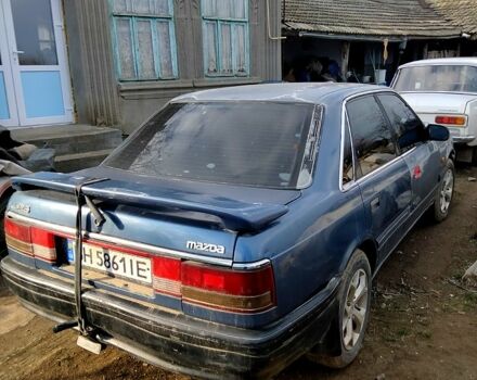 Синий Мазда 626, объемом двигателя 2 л и пробегом 328 тыс. км за 1100 $, фото 7 на Automoto.ua