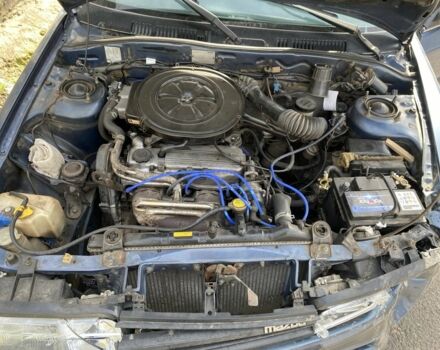 Синий Мазда 626, объемом двигателя 1.8 л и пробегом 150 тыс. км за 650 $, фото 4 на Automoto.ua