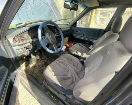 Синий Мазда 626, объемом двигателя 1.8 л и пробегом 150 тыс. км за 650 $, фото 3 на Automoto.ua