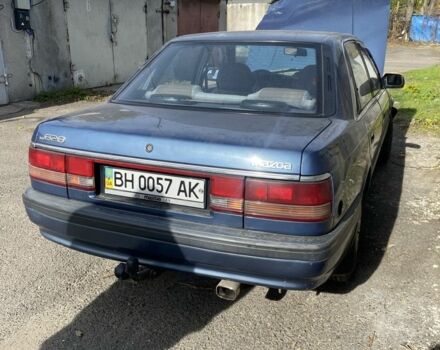 Синий Мазда 626, объемом двигателя 1.8 л и пробегом 150 тыс. км за 650 $, фото 2 на Automoto.ua