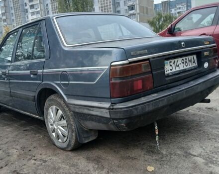 Синий Мазда 626, объемом двигателя 2 л и пробегом 292 тыс. км за 500 $, фото 5 на Automoto.ua