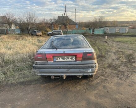 Синій Мазда 626, об'ємом двигуна 2 л та пробігом 300 тис. км за 714 $, фото 6 на Automoto.ua