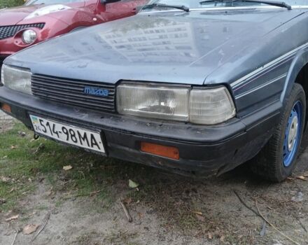 Синий Мазда 626, объемом двигателя 2 л и пробегом 292 тыс. км за 500 $, фото 1 на Automoto.ua