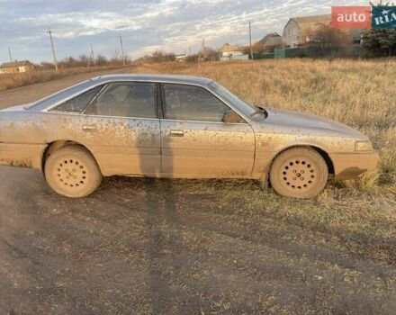 Синій Мазда 626, об'ємом двигуна 2 л та пробігом 300 тис. км за 714 $, фото 4 на Automoto.ua