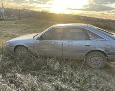 Синій Мазда 626, об'ємом двигуна 2 л та пробігом 300 тис. км за 714 $, фото 7 на Automoto.ua