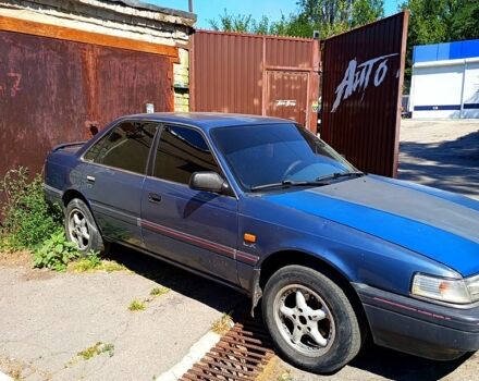 Синий Мазда 626, объемом двигателя 1.8 л и пробегом 1000 тыс. км за 950 $, фото 1 на Automoto.ua