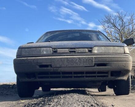 Синій Мазда 626, об'ємом двигуна 2 л та пробігом 300 тис. км за 714 $, фото 1 на Automoto.ua