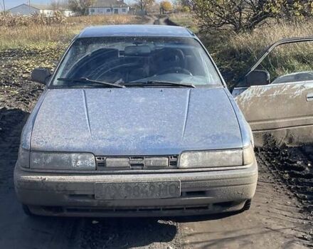 Синій Мазда 626, об'ємом двигуна 2 л та пробігом 300 тис. км за 714 $, фото 8 на Automoto.ua