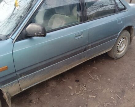 Синий Мазда 626, объемом двигателя 1.8 л и пробегом 1 тыс. км за 700 $, фото 3 на Automoto.ua