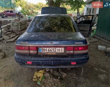 Синий Мазда 626, объемом двигателя 1.79 л и пробегом 200 тыс. км за 900 $, фото 1 на Automoto.ua