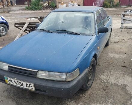 Синій Мазда 626, об'ємом двигуна 2 л та пробігом 100 тис. км за 850 $, фото 3 на Automoto.ua