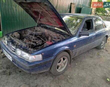 Синий Мазда 626, объемом двигателя 1.79 л и пробегом 200 тыс. км за 900 $, фото 6 на Automoto.ua