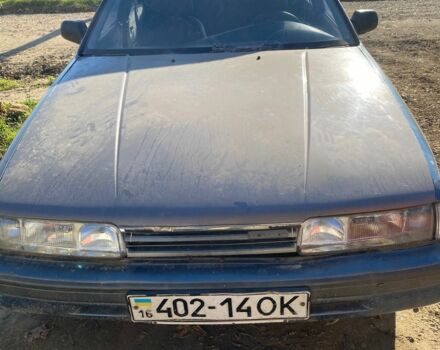 Синий Мазда 626, объемом двигателя 2 л и пробегом 3 тыс. км за 597 $, фото 4 на Automoto.ua