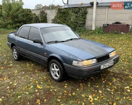 Синій Мазда 626, об'ємом двигуна 1.8 л та пробігом 90 тис. км за 850 $, фото 3 на Automoto.ua