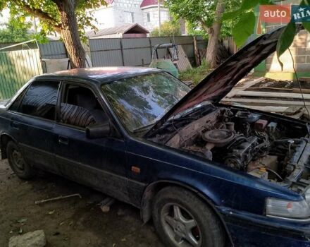 Синий Мазда 626, объемом двигателя 1.79 л и пробегом 200 тыс. км за 900 $, фото 4 на Automoto.ua