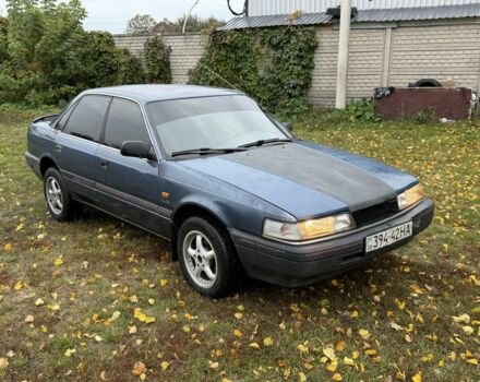 Синій Мазда 626, об'ємом двигуна 1.8 л та пробігом 50 тис. км за 850 $, фото 1 на Automoto.ua