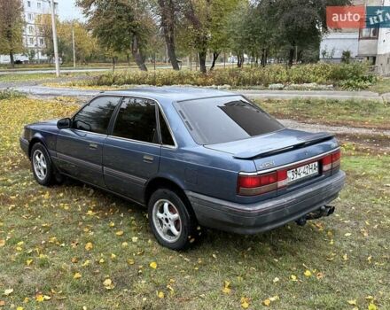 Синій Мазда 626, об'ємом двигуна 1.8 л та пробігом 90 тис. км за 850 $, фото 1 на Automoto.ua