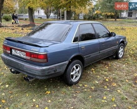 Синій Мазда 626, об'ємом двигуна 1.8 л та пробігом 90 тис. км за 850 $, фото 2 на Automoto.ua
