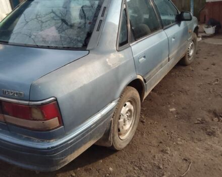 Синий Мазда 626, объемом двигателя 1.8 л и пробегом 1 тыс. км за 700 $, фото 1 на Automoto.ua