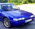 Синий Мазда 626, объемом двигателя 1.8 л и пробегом 100 тыс. км за 2100 $, фото 1 на Automoto.ua