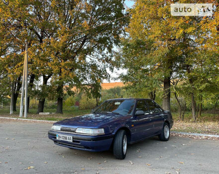 Синий Мазда 626, объемом двигателя 2 л и пробегом 340 тыс. км за 1999 $, фото 5 на Automoto.ua
