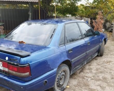 Мазда 626 1991 в Синельниковом на Automoto.ua Синий Мазда 626, объемом двигателя 1.8 л и пробегом 120 тыс. км за 552 $, фото 2 на Automoto.ua